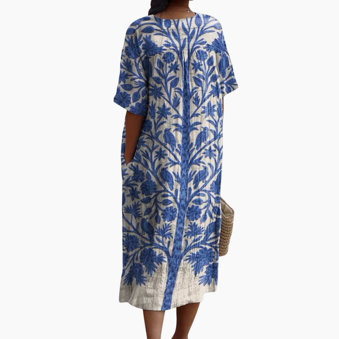 Orinthia | Women’s Blue Midi Dress in a Relaxed Botanical Design