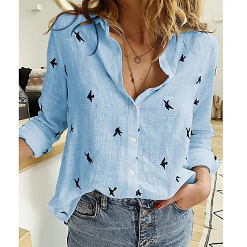 Amelora | Women’s Button Shirt featuring a Small Bird Graphic