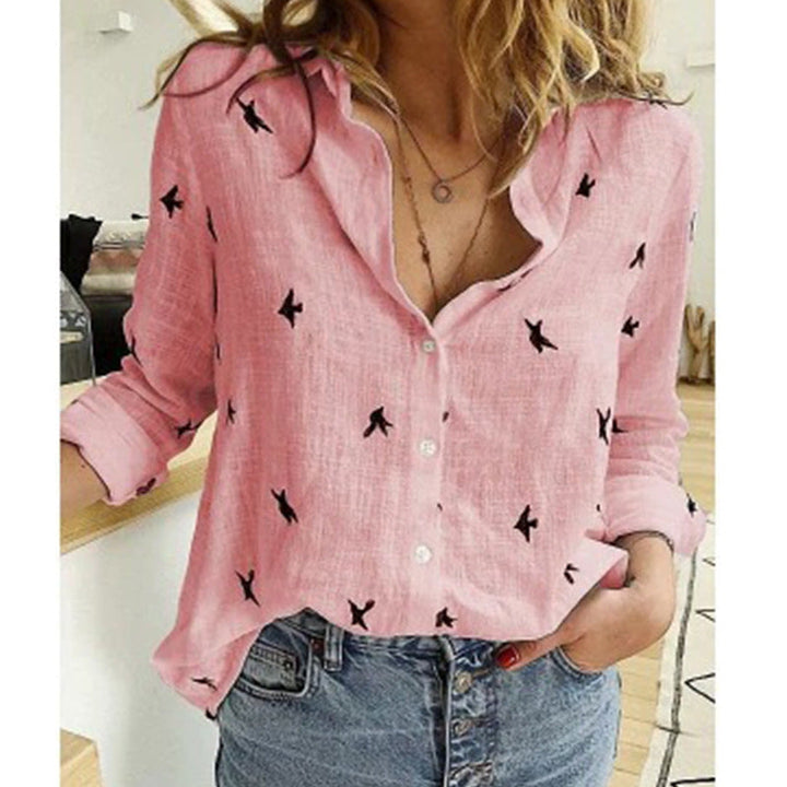 Amelora | Women’s Button Shirt featuring a Small Bird Graphic