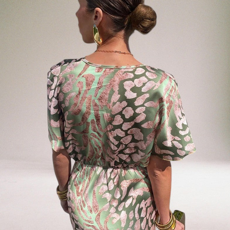 Ismerie | Women’s Midi Dress featuring a Twisted Front feature